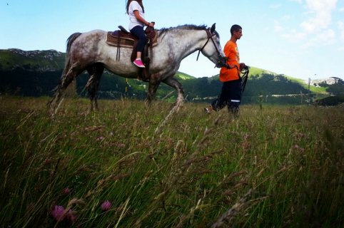 Horse riding over Cerrano hills in Abruzzo
