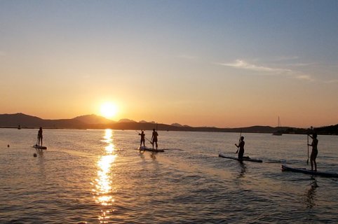 Stand up paddle at the sunset in Sardinia